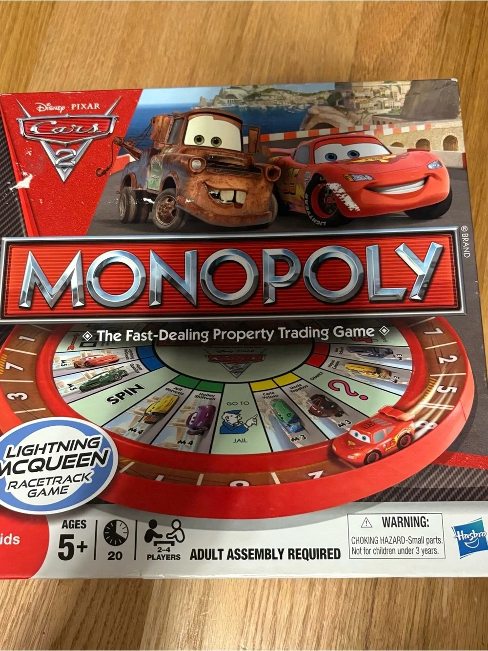 Disney Cars 2 Lightning McQueen Red Monopoly Board Game Racetrack Lightning
